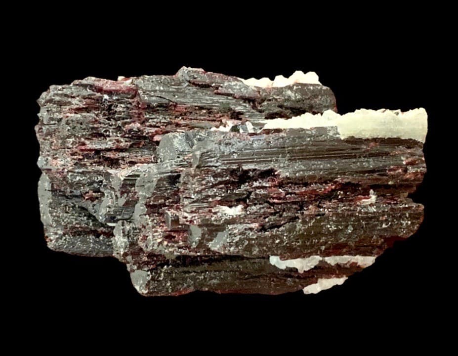 Hubnerite, minor Muscovite and Quartz